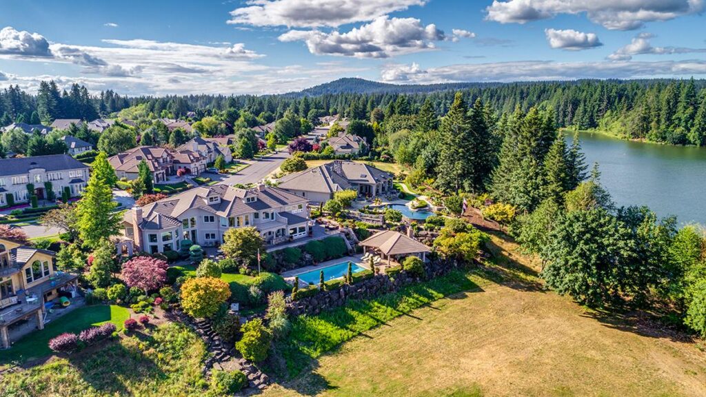 Contemporary luxury homes beside a Pacific Northwest lake